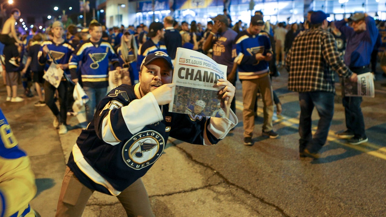 Blues are toast of a town that's been in a bit of a title drought
